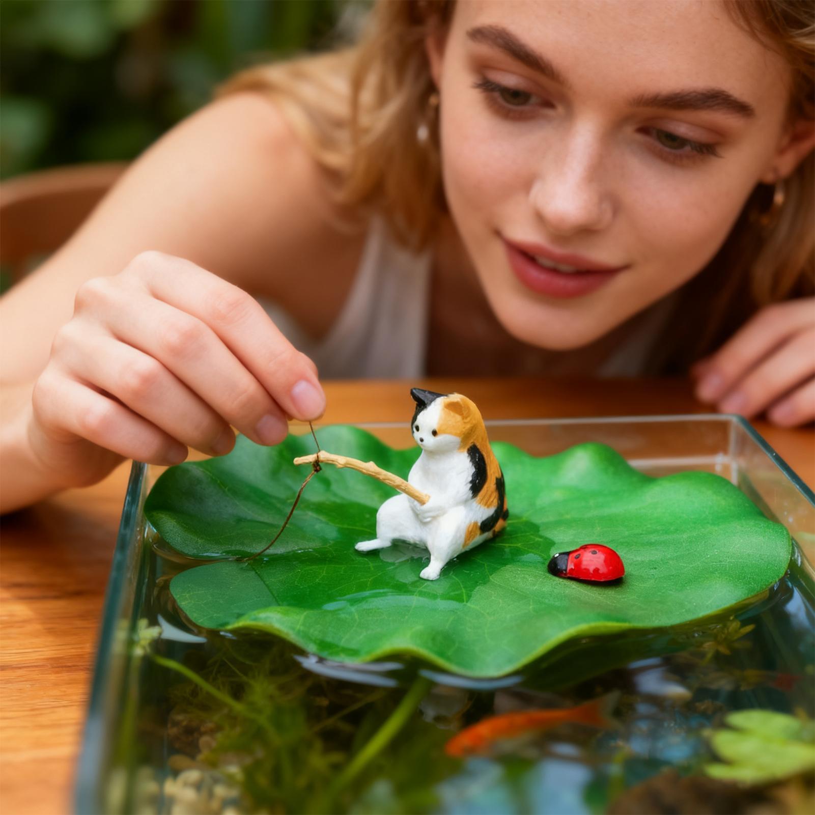 Aquarium Fish Names - Cat Fishing on Floating Lily Pad